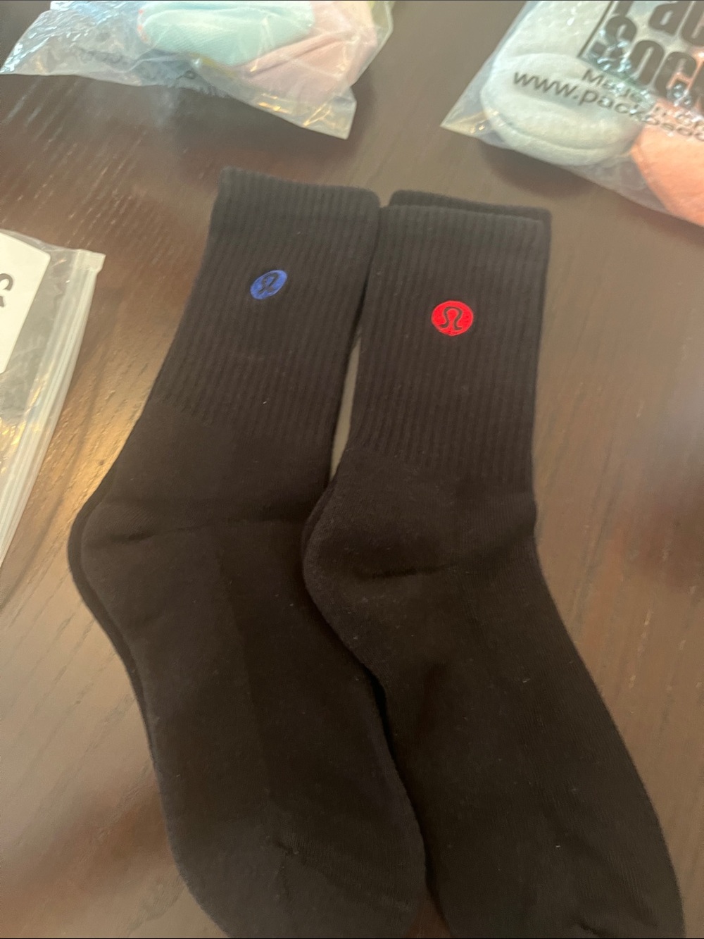 NWOT lululemon athletica Black Crew Socks with Red & Blue Logos